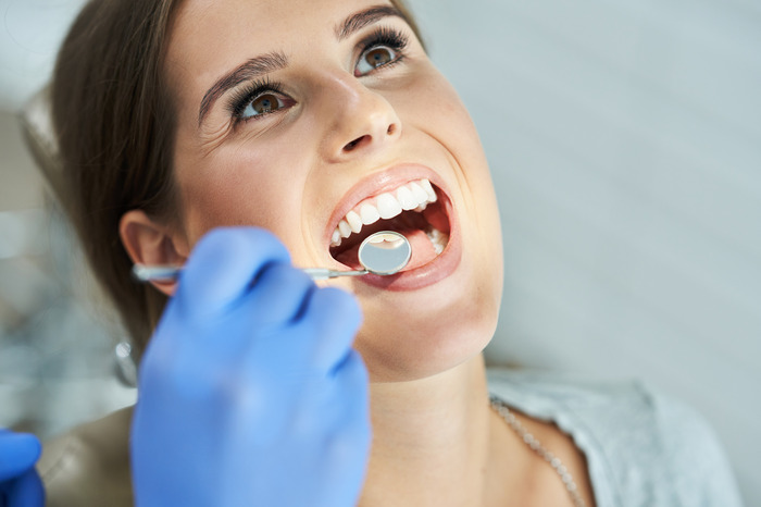 woman getting dental checkup